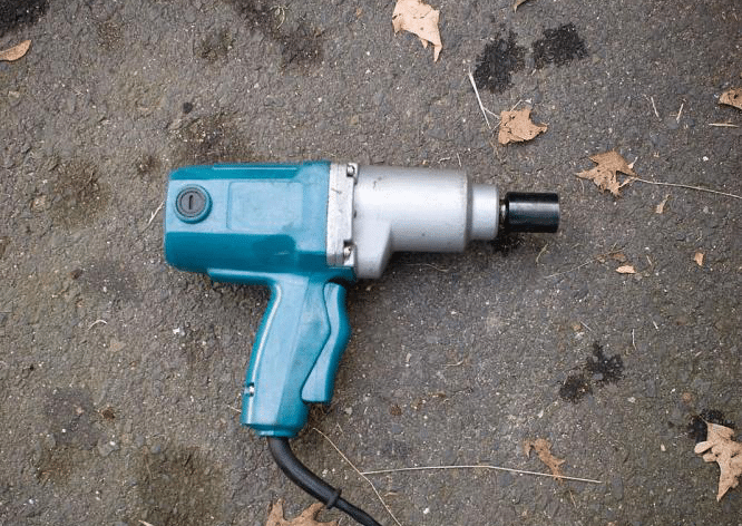 An impact wrench on the floor